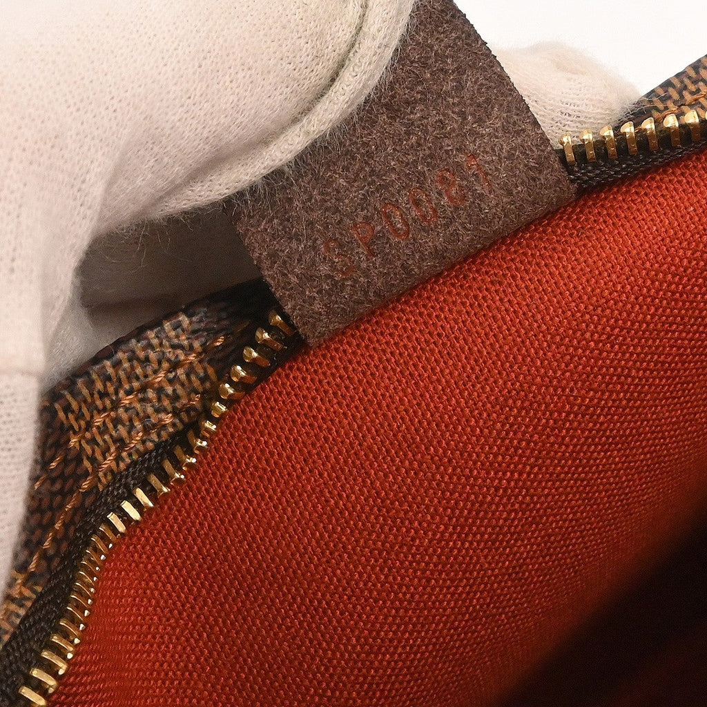Louis Vuitton Trousse Make Up Bag Damier Canvas Brown Canvas Clutche & Pouche Bag (Pre-Owned)