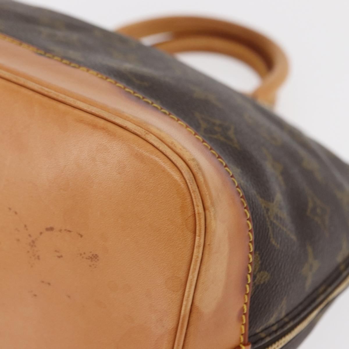 Louis Vuitton Alma Handbag Monogram Canvas Brown Canvas Handbag (Pre-Owned)