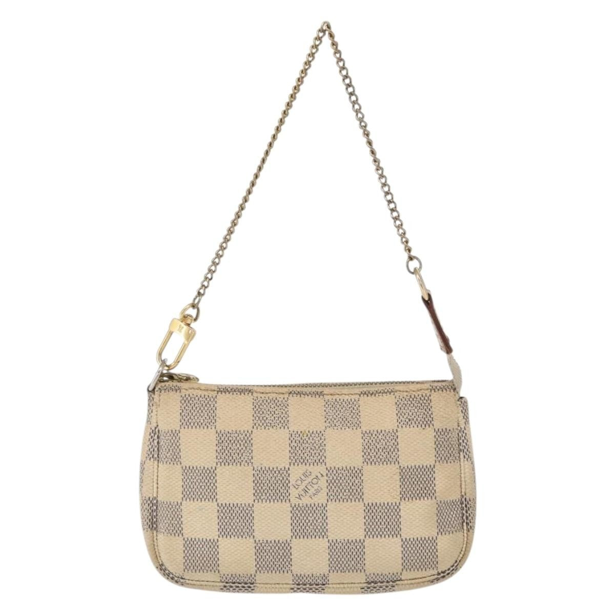 Louis Vuitton Mini Pochette Accessoires Damier Canvas White Canvas Clutche & Pouche Bag (Pre-Owned)