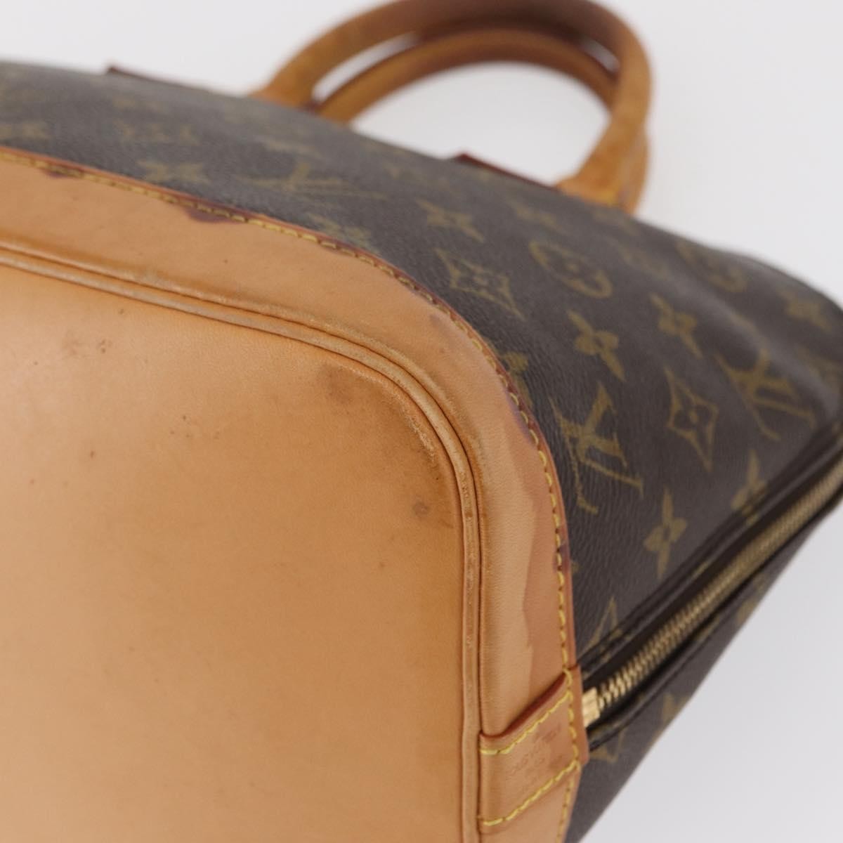 Louis Vuitton Alma Handbag Monogram Canvas Brown Canvas Handbag (Pre-Owned)