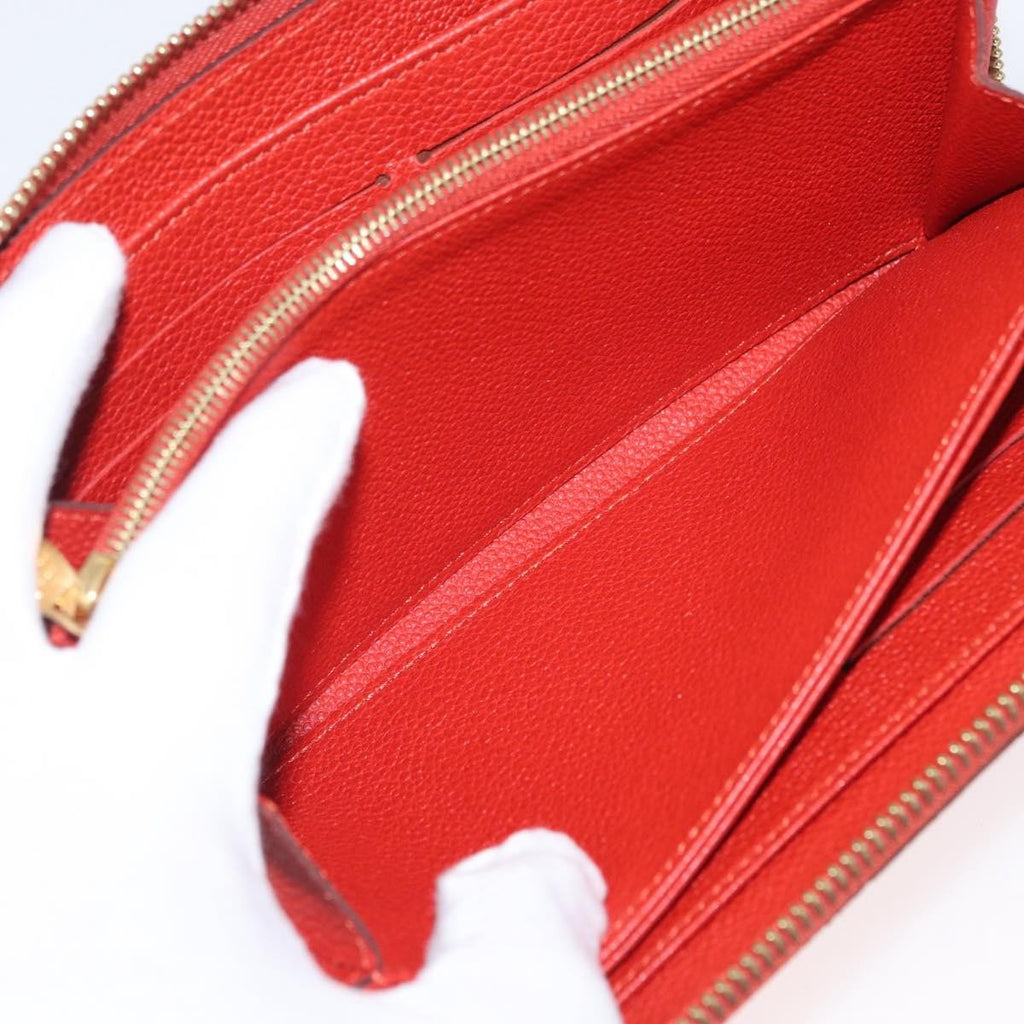 Louis Vuitton Portefeuille Zippy Monogramme Empreinte Monogramme Empreinte Orange Leather Wallets Accessory (Pre-Owned)