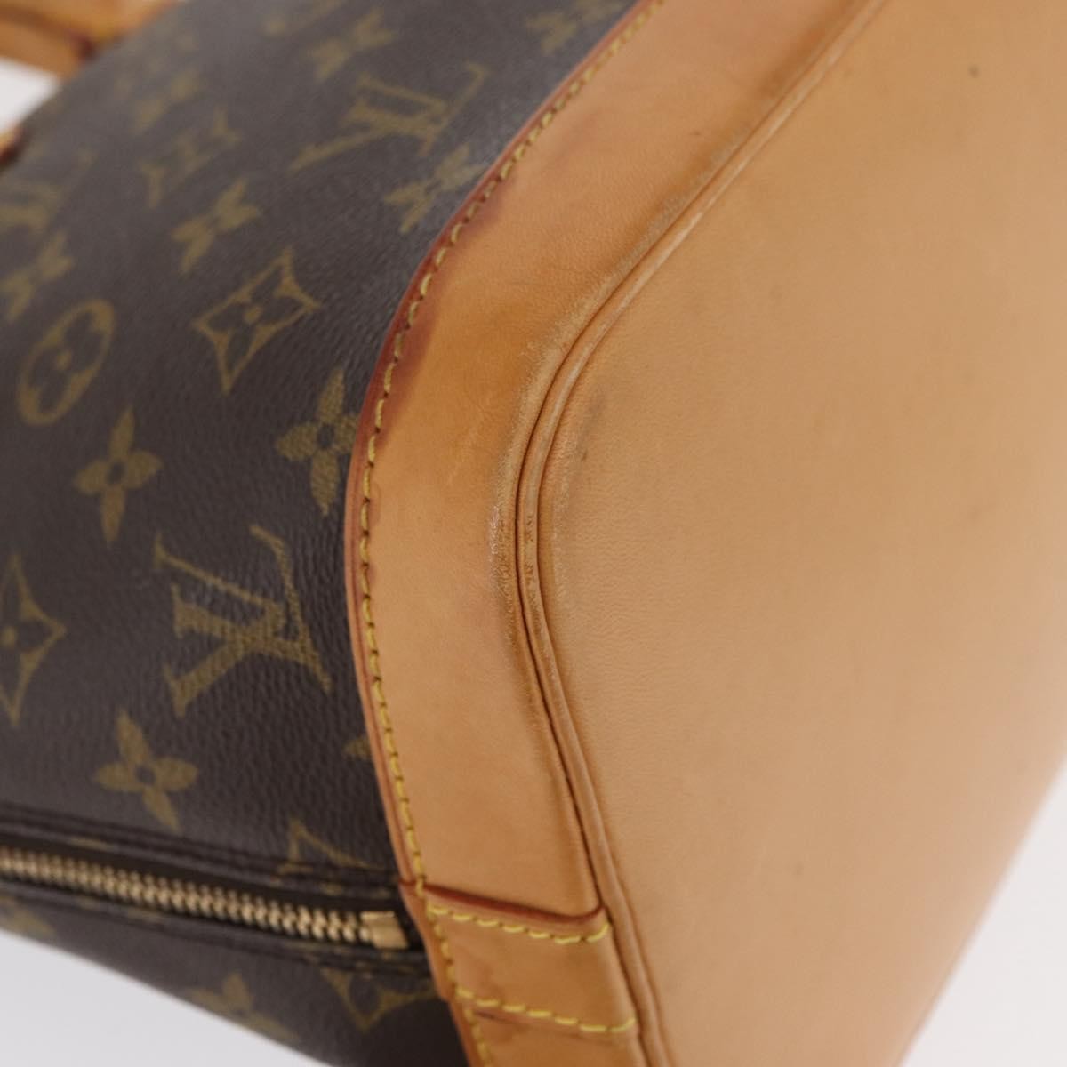 Louis Vuitton Alma Handbag Monogram Canvas Brown Canvas Handbag (Pre-Owned)