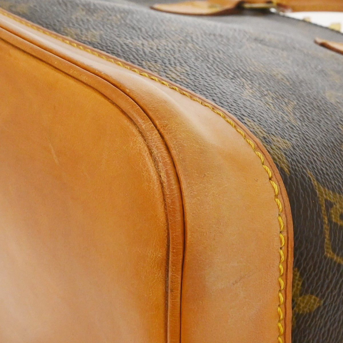 Louis Vuitton Alma Handbag Monogram Canvas Brown Canvas Handbag (Pre-Owned)