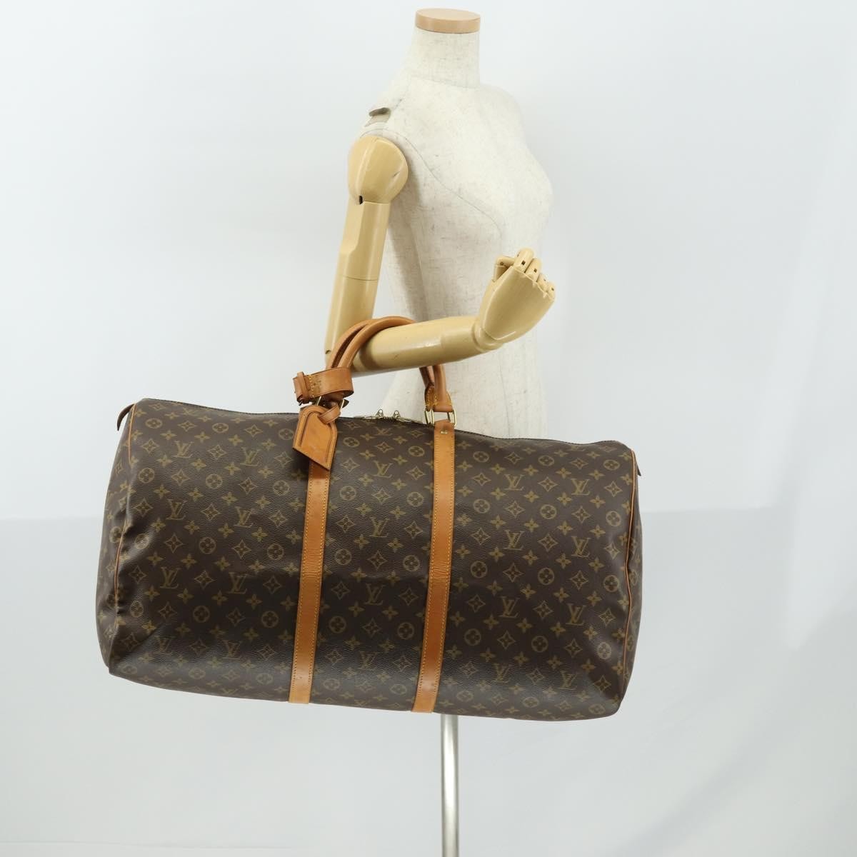 Louis Vuitton Keepall Bag Monogram Canvas Brown Canvas Travel Bag Bag (Pre-Owned)