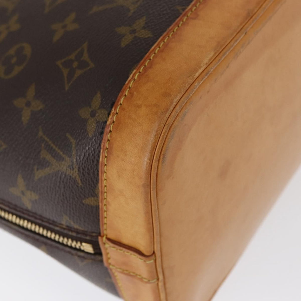 Louis Vuitton Alma Handbag Monogram Canvas Brown Canvas Handbag (Pre-Owned)