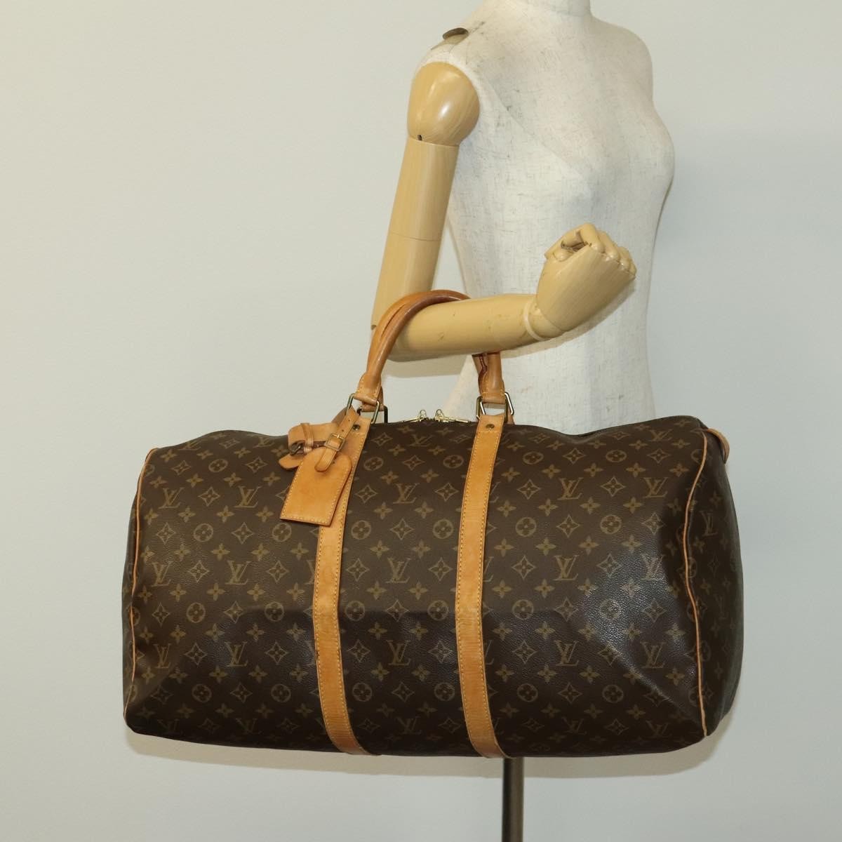Louis Vuitton Keepall Bag Monogram Canvas Brown Canvas Travel Bag Bag (Pre-Owned)