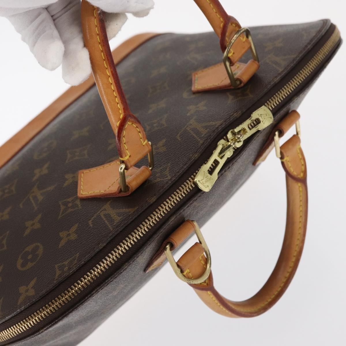 Louis Vuitton Alma Handbag Monogram Canvas Brown Canvas Handbag (Pre-Owned)