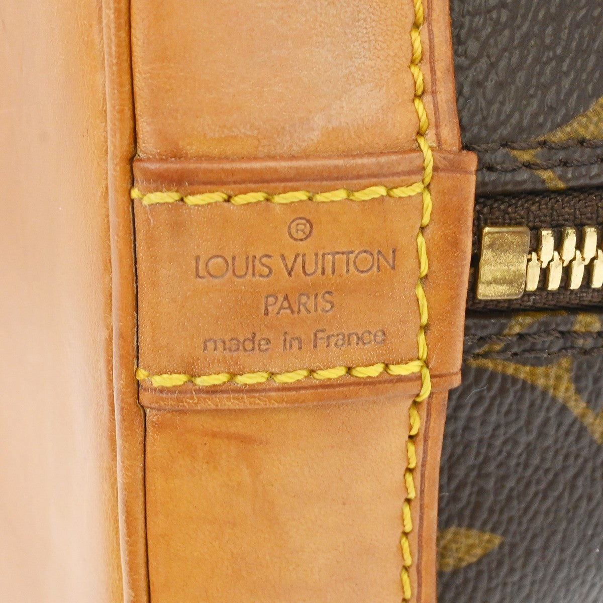 Louis Vuitton Alma Handbag Monogram Canvas Brown Canvas Handbag (Pre-Owned)