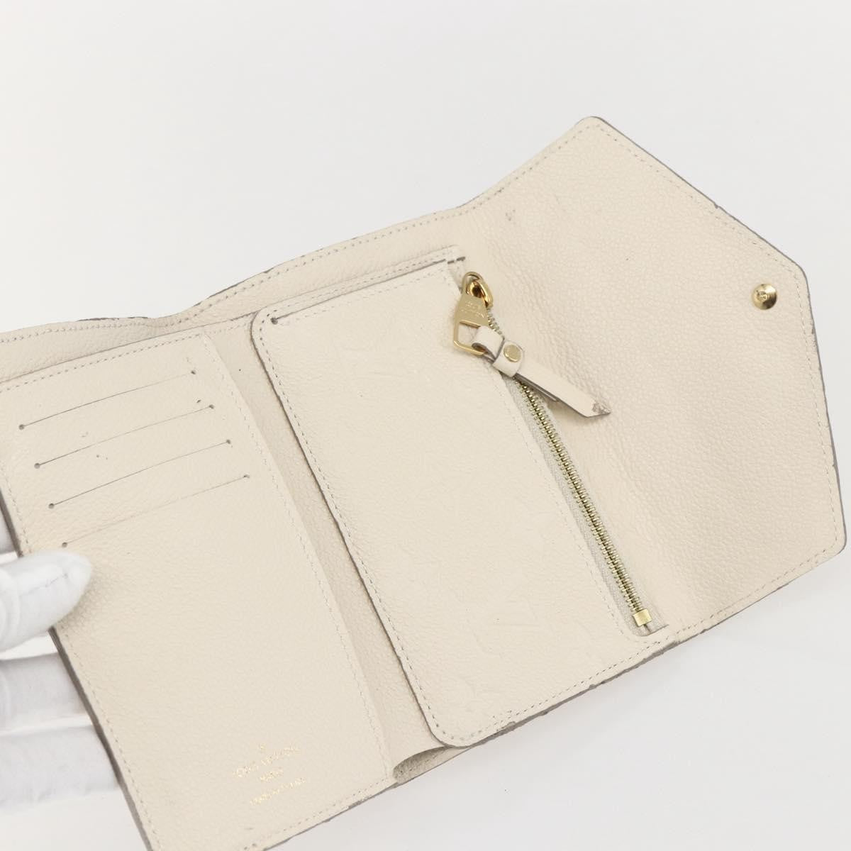 Louis Vuitton Zoe Wallet Monogram Empreinte Leather Beige Leather Wallets Accessory (Pre-Owned)