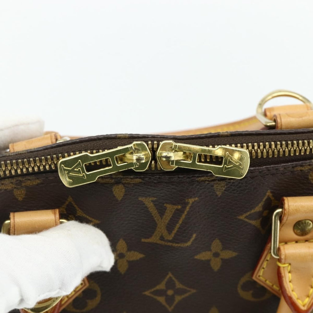 Louis Vuitton Alma Handbag Monogram Canvas Brown Canvas Handbag (Pre-Owned)