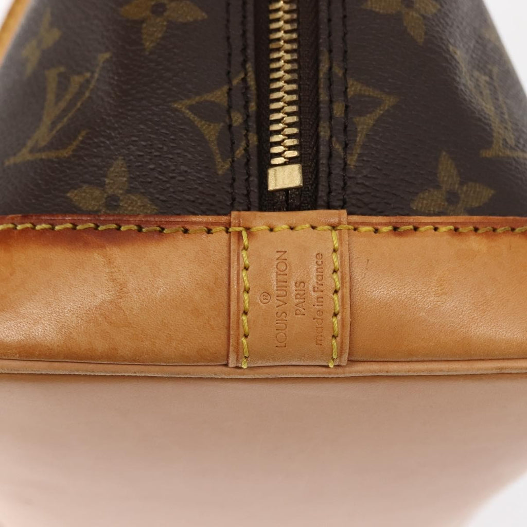 Louis Vuitton Alma Handbag Monogram Canvas Brown Canvas Handbag (Pre-Owned)