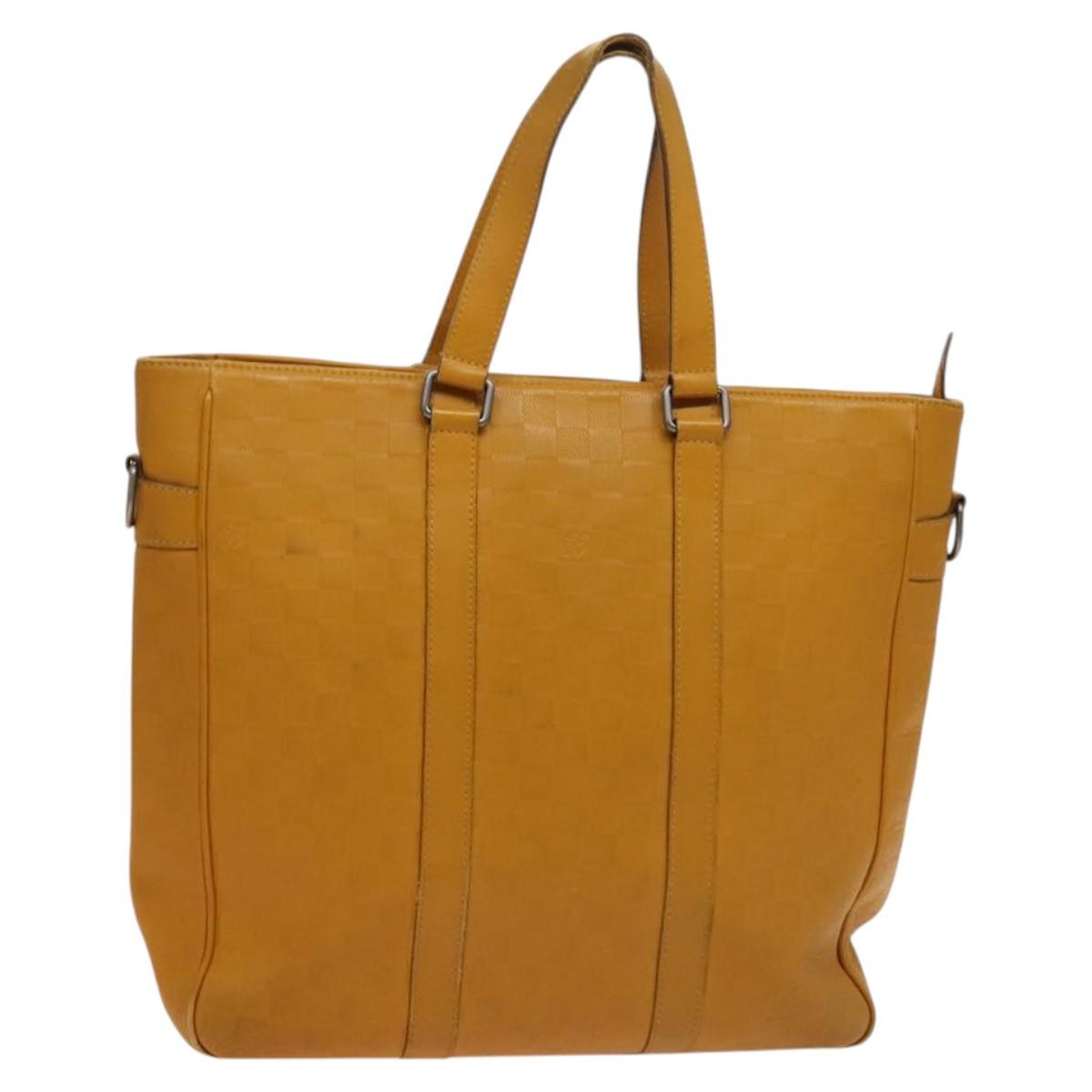 Louis Vuitton Tadao Handbag Damier Infini Leather Yellow Leather Handbag (Pre-Owned)