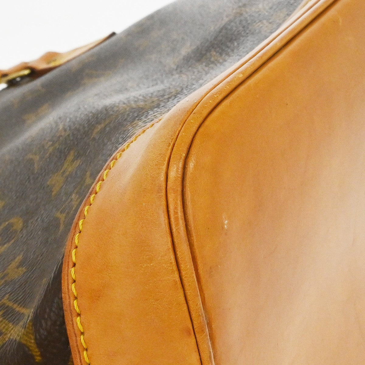 Louis Vuitton Alma Handbag Monogram Canvas Brown Canvas Handbag (Pre-Owned)
