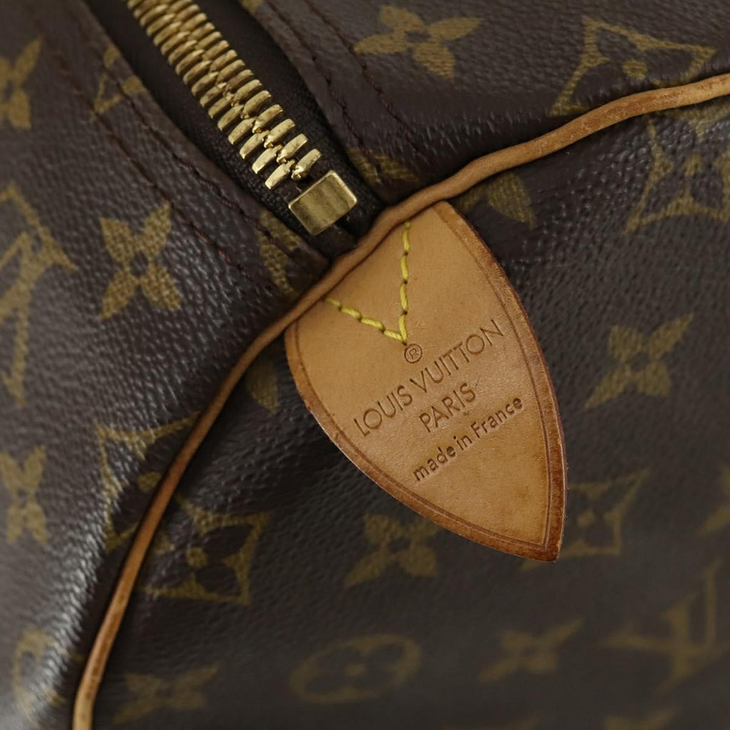 Louis Vuitton Keepall Bag Monogram Canvas Brown Canvas Travel Bag Bag (Pre-Owned)