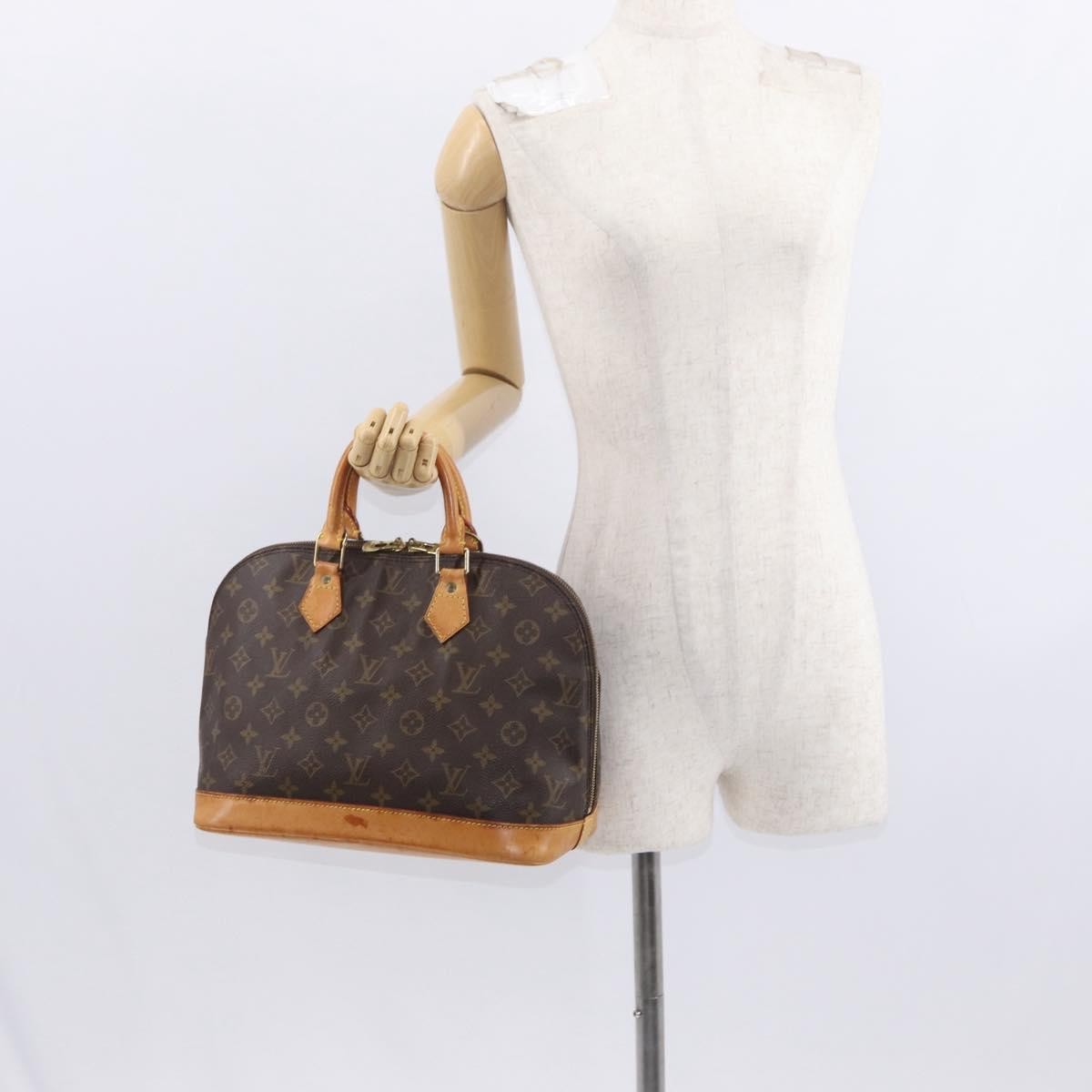 Louis Vuitton Alma Handbag Monogram Canvas Brown Canvas Handbag (Pre-Owned)