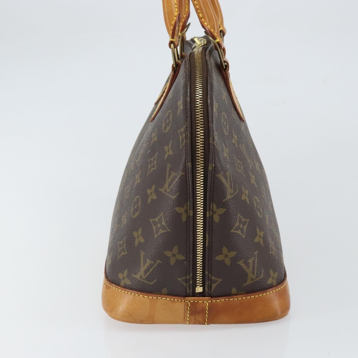 Louis Vuitton Alma Handbag Monogram Canvas Brown Canvas Handbag (Pre-Owned)