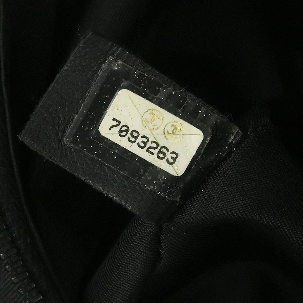 Chanel Travel Line Barrel Bag Nylon Black Nylon Handbag (Pre-Owned)