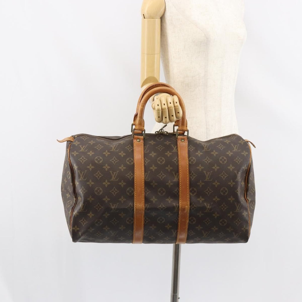 Louis Vuitton Keepall Bag Monogram Canvas Brown Canvas Travel Bag Bag (Pre-Owned)