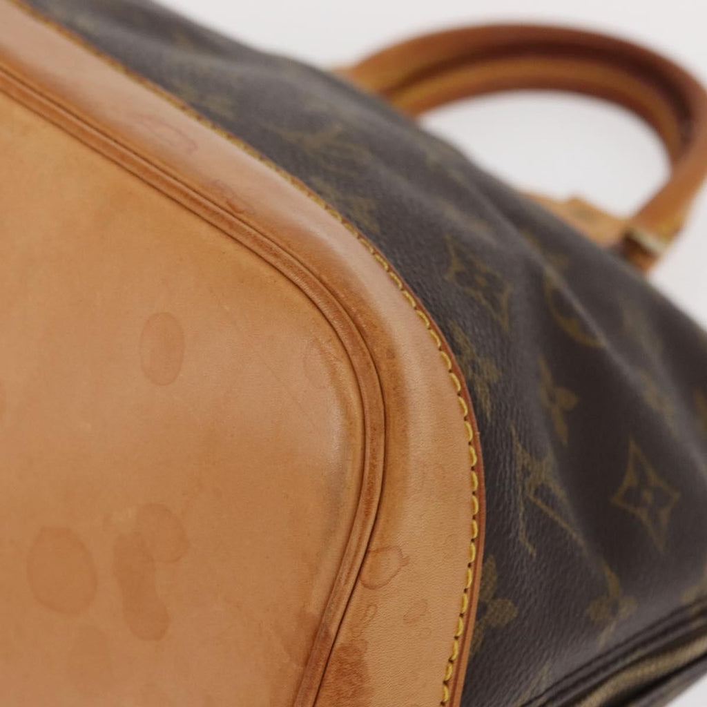 Louis Vuitton Alma Handbag Monogram Canvas Brown Canvas Handbag (Pre-Owned)