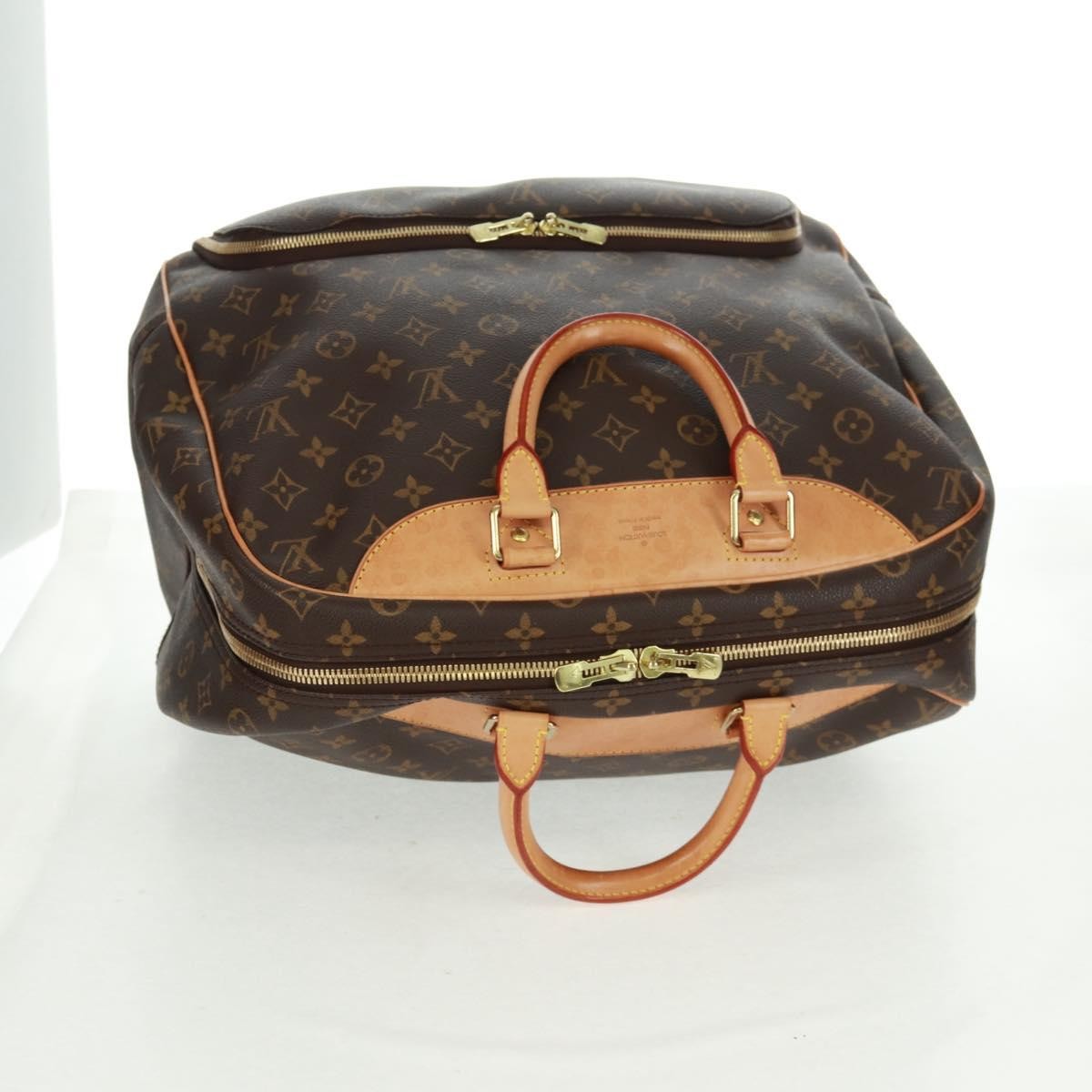 Louis Vuitton Evasion Travel Bag Monogram Canvas Brown Canvas Travel Bag Bag (Pre-Owned)