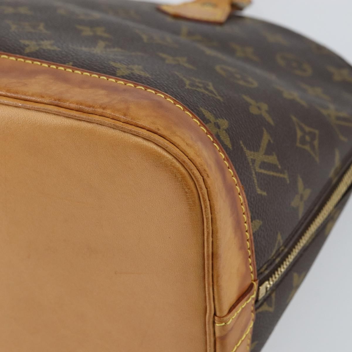 Louis Vuitton Alma Handbag Monogram Canvas Brown Canvas Handbag (Pre-Owned)