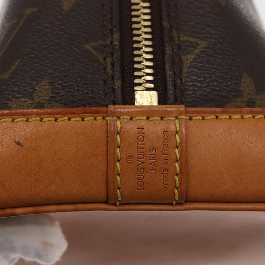 Louis Vuitton Alma Handbag Monogram Canvas Brown Canvas Handbag (Pre-Owned)