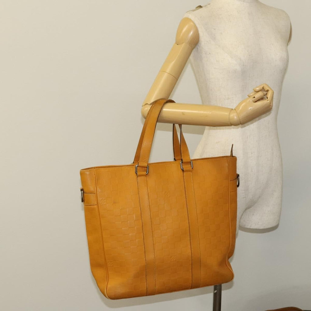 Louis Vuitton Tadao Handbag Damier Infini Leather Yellow Leather Handbag (Pre-Owned)