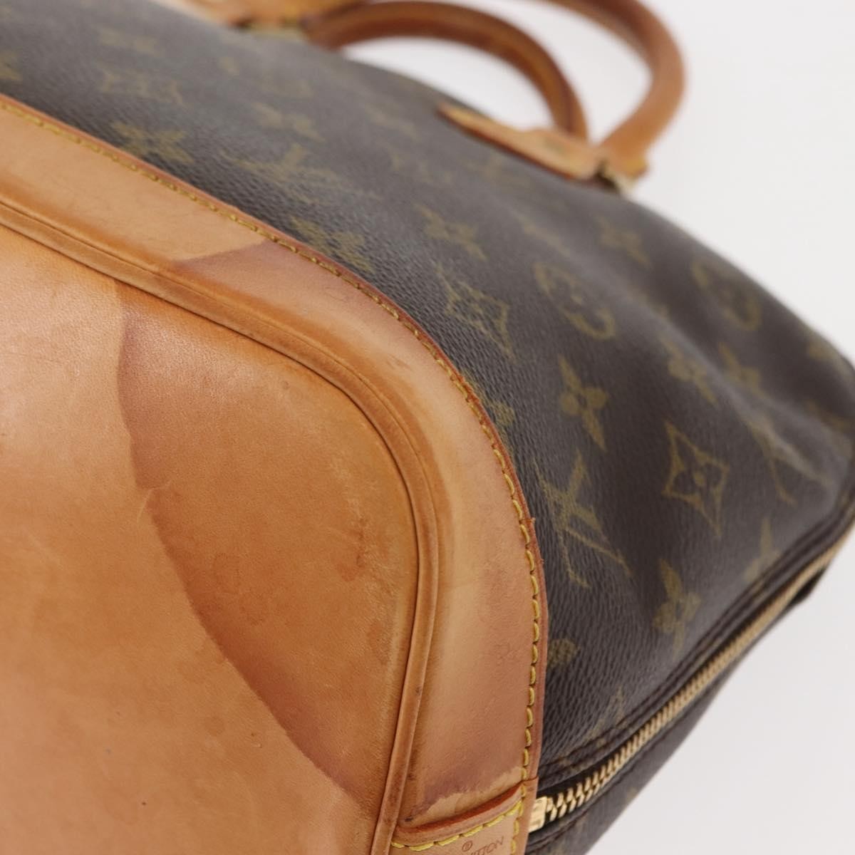 Louis Vuitton Alma Handbag Monogram Canvas Brown Canvas Handbag (Pre-Owned)