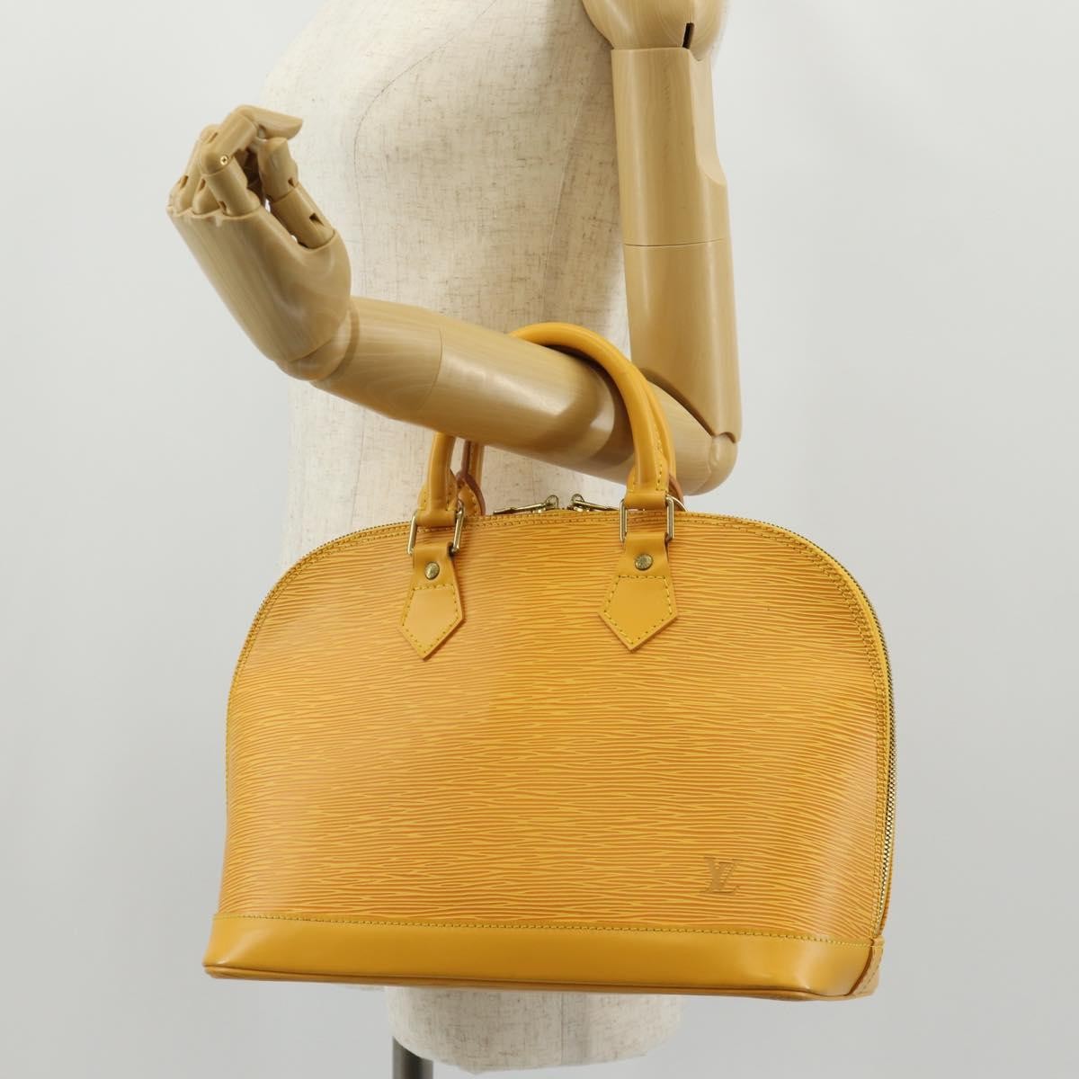 Louis Vuitton Alma Handbag Epi Leather Yellow Leather Handbag (Pre-Owned)